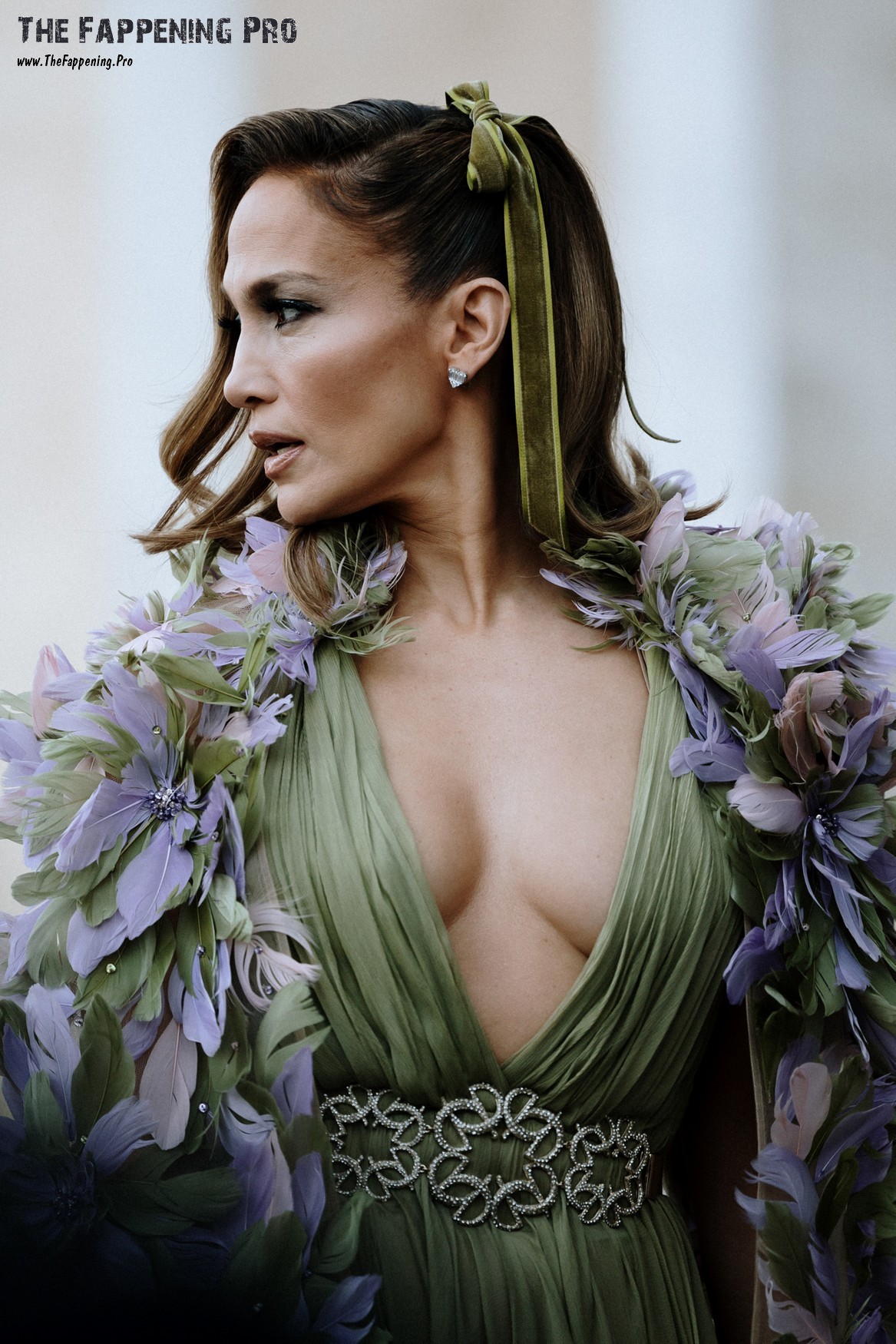 Step into the glamorous world of fashion as Jennifer Lopez steals the show at the Elie Saab Haute Couture Spring Summer 2024 show in Paris. The 54-year-old celebrity stunned everyone with her bold outfit, featuring a deep cleavage that showcased her enviable curves. Fans couldn't stop talking about J Lo's daring look, proving once again that she's not afraid to take risks when it comes to fashion. Witness the star's confidence and sex appeal as she flaunts her assets on the runway, reminding us all why she's a true icon in the industry. Get ready to be mesmerized by Jennifer Lopez's unforgettable appearance at this unforgettable event!