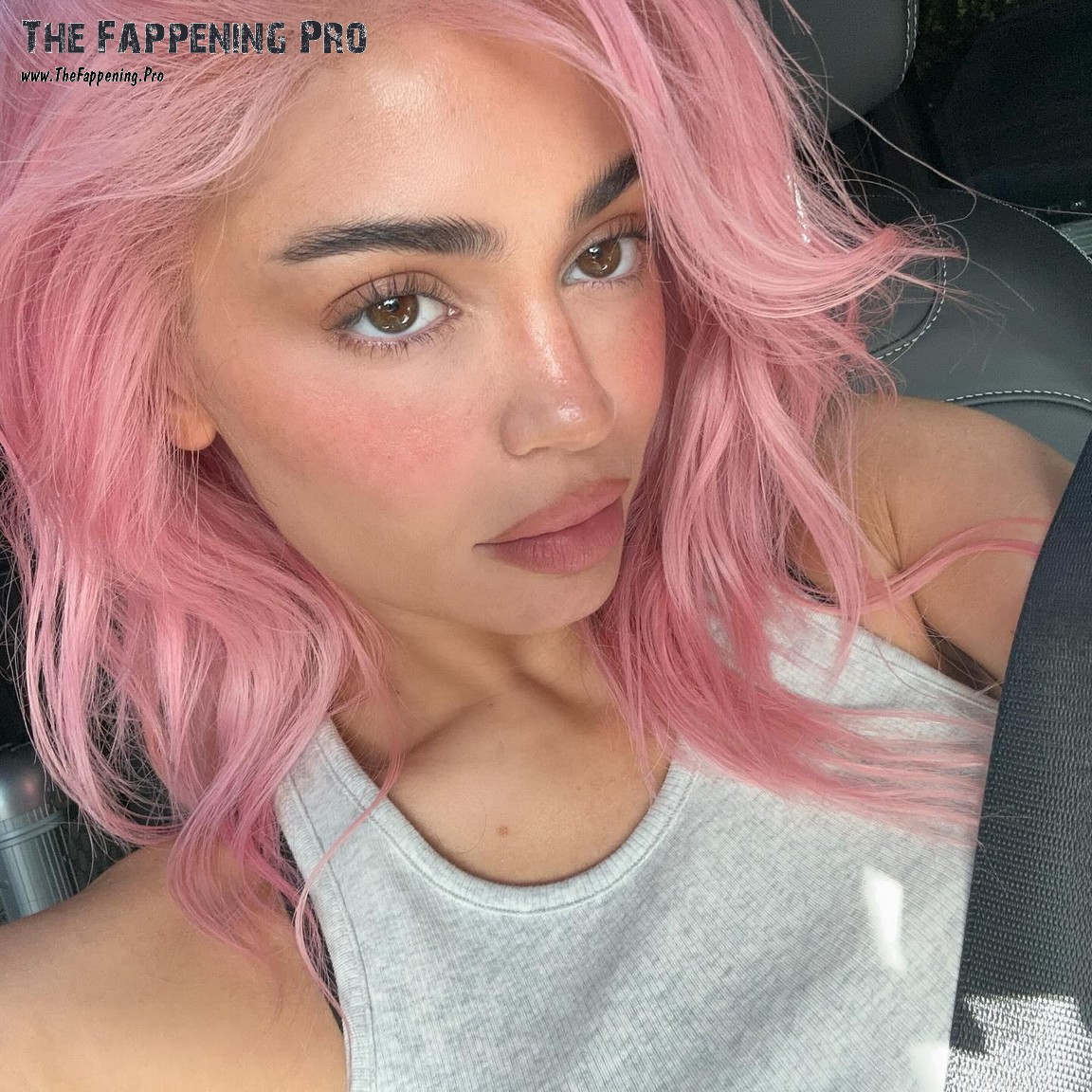 Get ready to be shocked by the latest transformation of Kylie Jenner! The 26-year-old brunette has surprised her fans by sporting a stunning pink hair look in a series of jaw-dropping selfies. With a touch of freckles on her face, she exudes a youthful and sexy vibe that has everyone talking. Fans couldn't contain their excitement and flooded her social media with enthusiastic comments. Will this daring new style be a permanent change for Kylie? Stay tuned for more sizzling updates from the style icon!