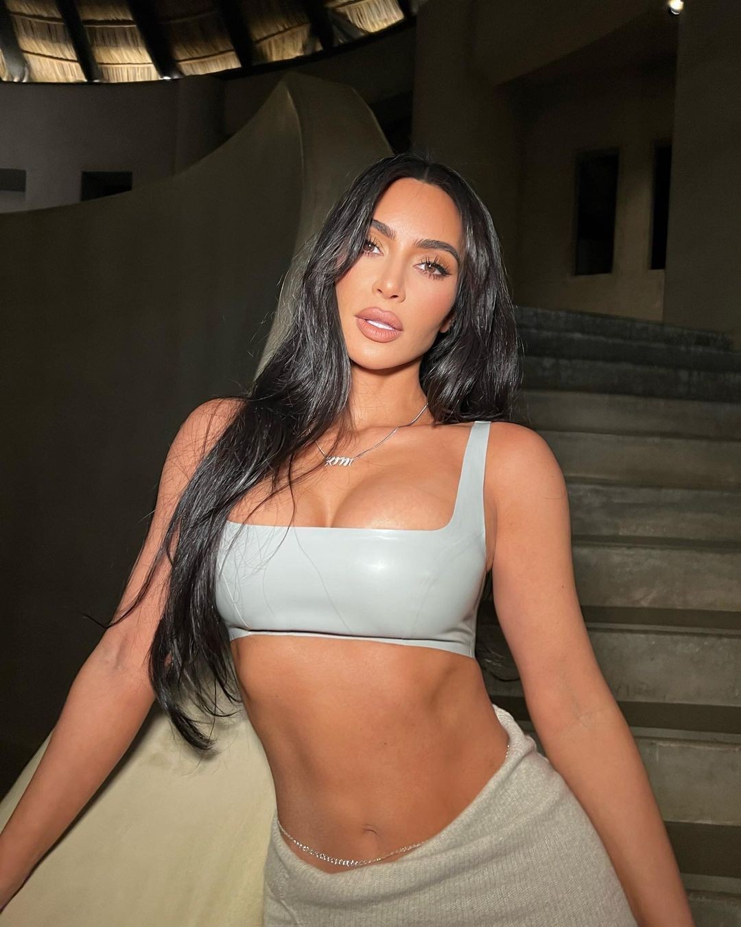 In a surprising turn of events, Kim Kardashian stole the spotlight by flaunting her ample cleavage in new selfies, sparking comparisons to Megan Fox. Despite missing the Oscar Party, the reality celebrity ensured she didn't miss out on the night's trend of showcasing her assets. See how Kim's daring display shook up Hollywood's hottest party!