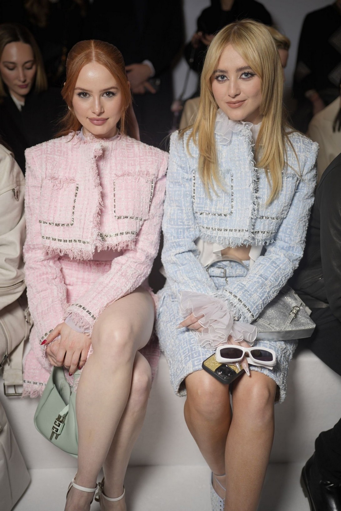 At the Givenchy fashion show during Paris Fashion Week, Madelaine Petsch shocked attendees with her bold and daring outfit choice. What seemed like a cute and modest pink ensemble quickly turned heads as she revealed a scandalous surprise underneath. With just a thin, see-through top and no bra on display, Madelaine flaunted her bare chest with the jacket wide open, leaving a lasting impression on the audience. The unexpected twist added a thrilling element to the event, showcasing Petsch's fearless and confident style.
