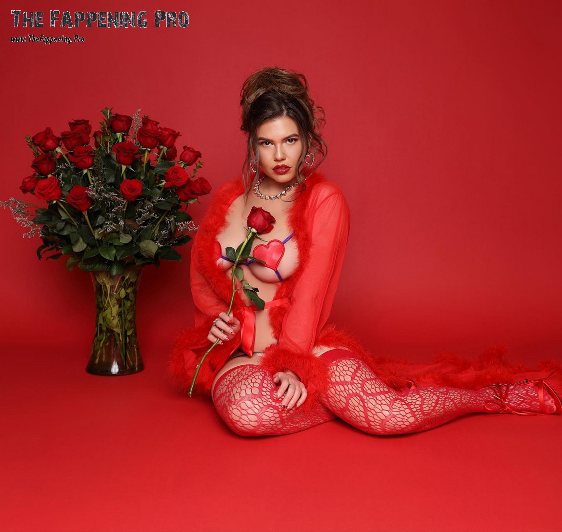 Get ready for some sizzling hot photos from Chanel West Coast! The 35-year-old celebrity stunned fans with her Valentine's Day photos, flaunting her curves in a revealing bra and red stockings. After a recent pregnancy, Chanel is back to looking slim and seductive. And that's not all - she has a new Snapchat page where she promises to share even more steamy pictures. Don't miss out on this tantalizing glimpse into Chanel's sexy side!