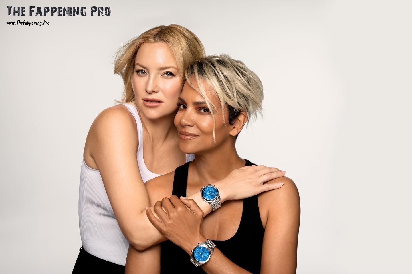 Get ready for a thrilling collaboration as Halle Berry and Kate Hudson team up for the Michael Kors #WatchHungerStop campaign. In a jaw-dropping photo shoot, the dynamic duo flaunted a stunning blue watch, with proceeds going towards a good cause. But what really stole the spotlight? Halle and Kate showing off their killer legs in tiny shorts. Check out the sizzling photoshoot that's for a cause and oozing with glamour!