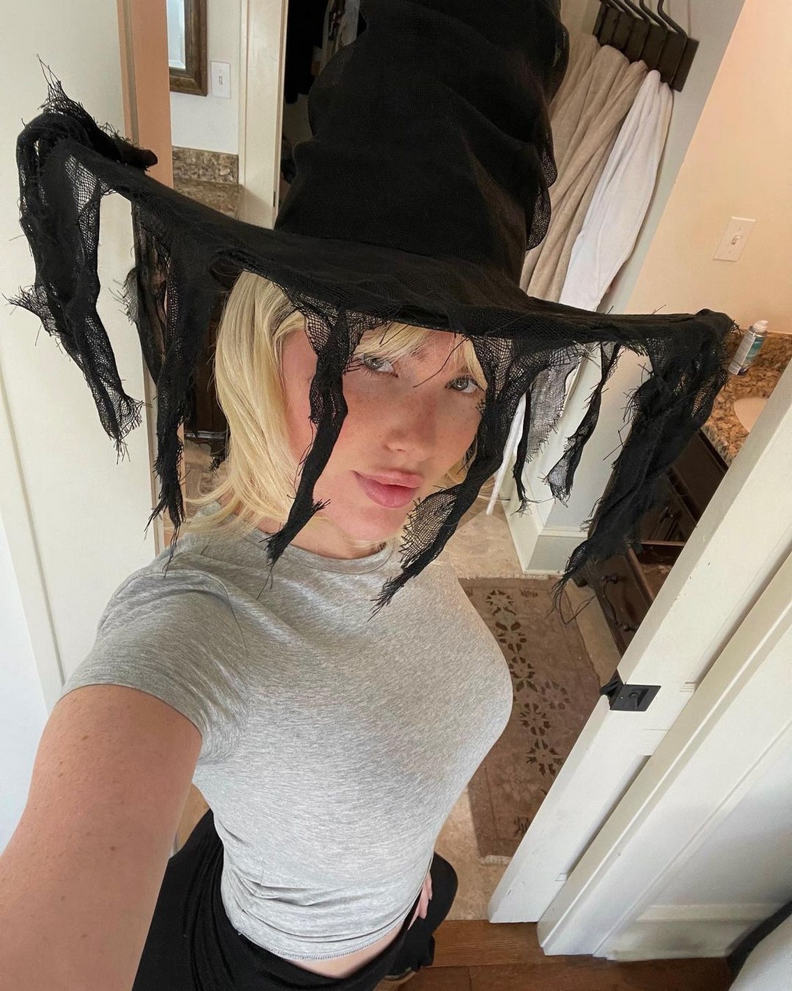 Join Maddy Cloud as she embraces the Halloween spirit with a witch hat and a sprinkle of freckles on her lovely face. Stay tuned for more updates on her festive look as she tantalizes us with her charming presence. Keep an eye out for the next post to see what other surprises she has in store for us!