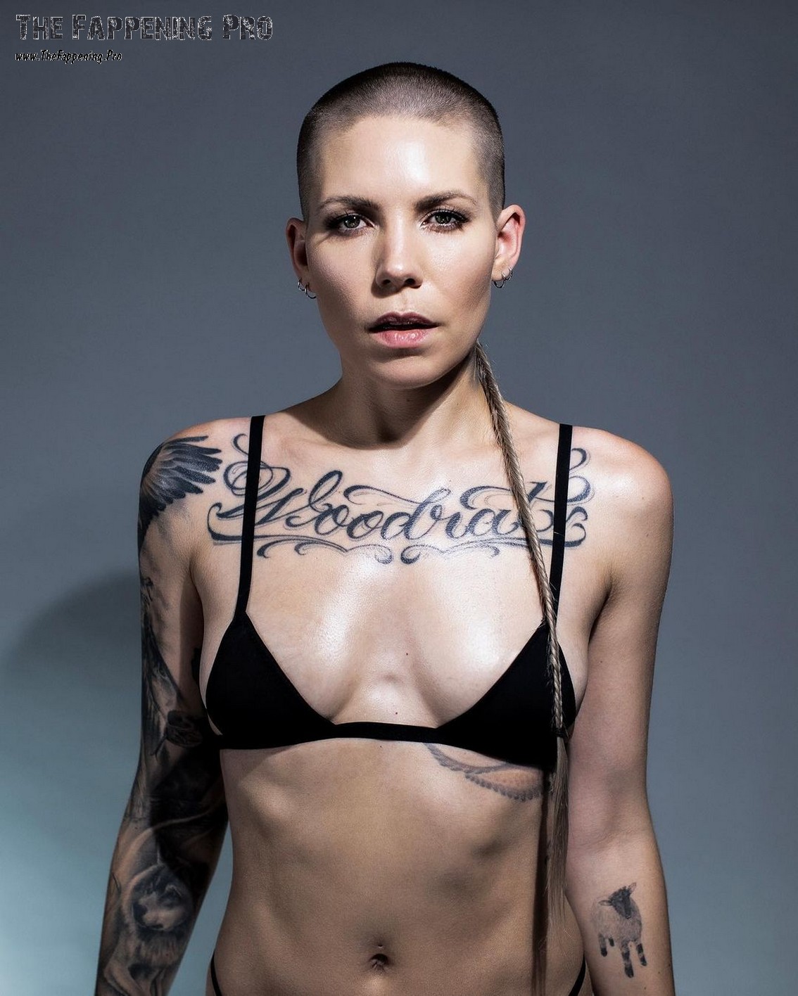 Get ready for a wild ride with American singer Skylar Grey as she continues to push the boundaries of her image. Sporting a unique hairstyle with a short-shaven head and a ponytail, along with a plethora of tattoos, she's redefining what it means to be sexy. In daring photos for multiple magazines, including Numero, Skylar Grey bares it all, flaunting her tattoos, backside, and toes, all while keeping her top covered. Don't miss out on this edgy and provocative transformation.